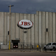 A JBS meat processing plant in Greeley, Colorado stands dormant after halting operations on June 1, 2021.